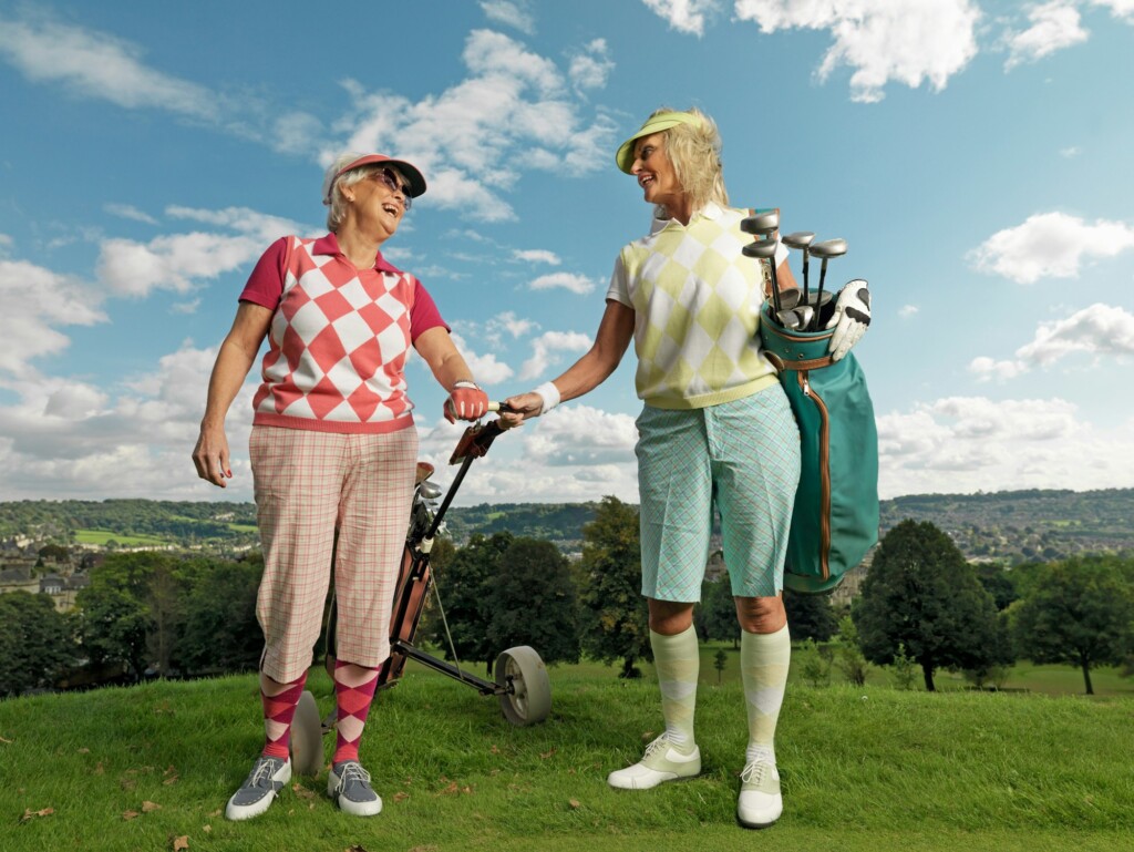 Mature ladies playing golf