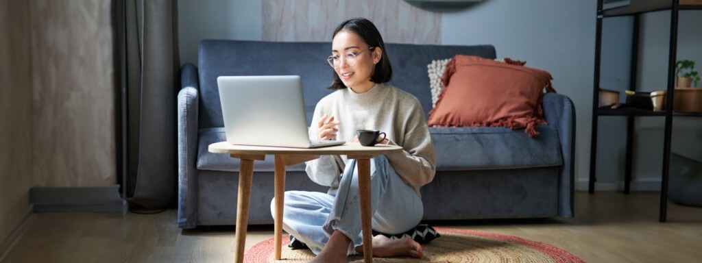 Portrait of beautiful young woman professional, working on remote from home, freelancing with her
